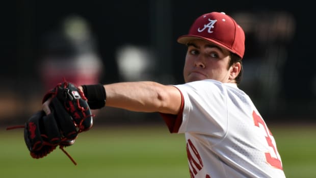 Alabama pitcher Luke Holman (33) pitches in relief against Binghamton Friday, March 11, 2022, in Sewell-Thomas Stadium. Alabama Vs Binghamton Baseball